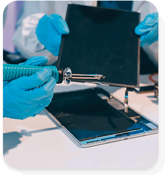 Technician repairing a tablet